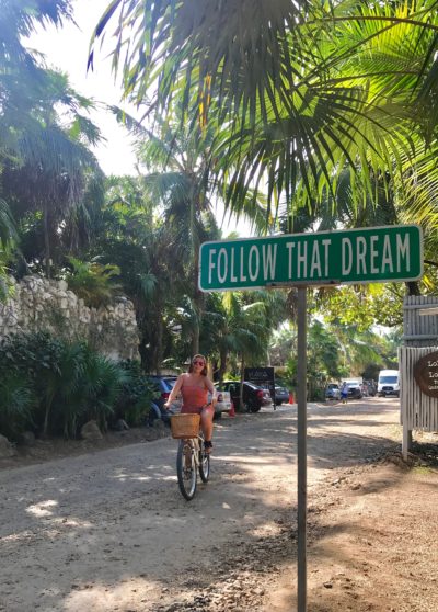 sign saying follow that dream